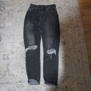 dark grey straight leg jeans with rips